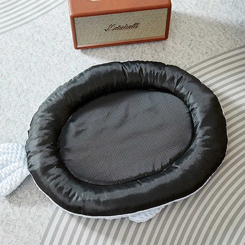 Cama refrescante transpirable con forma de animal para perros y gatos. Comodidad y diversión para el verano.